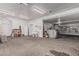 Spacious garage featuring additional storage and work areas, ideal for hobbies and home improvement projects at 2254 E Becker Ln, Phoenix, AZ 85028