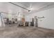 Spacious garage with ample room for parking, storage, and projects, featuring a clean and organized layout at 2254 E Becker Ln, Phoenix, AZ 85028