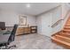 Spacious home office features stylish wood-look floors, storage and natural light, ideal for a functional workspace at 2254 E Becker Ln, Phoenix, AZ 85028