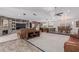 Expansive living area showcasing the seamless integration of living, dining, and kitchen spaces at 2254 E Becker Ln, Phoenix, AZ 85028