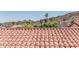 View of clay roof tiles with desert mountain views at 2254 E Becker Ln, Phoenix, AZ 85028