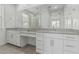 Bright bathroom with double vanity, gray countertop, and large mirror at 23068 E Stacey Rd, Queen Creek, AZ 85142