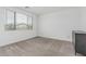 Carpeted bedroom with natural light at 23068 E Stacey Rd, Queen Creek, AZ 85142