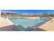 Stunning community pool with lounge chairs and shade, perfect for relaxation and recreation at 23068 E Stacey Rd, Queen Creek, AZ 85142