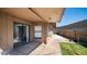 Covered patio with sliding glass door that provides seamless indoor-outdoor living at 2337 E Riviera Dr, Tempe, AZ 85282