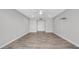 A bright bedroom with a ceiling fan and wood-look flooring at 2337 E Riviera Dr, Tempe, AZ 85282