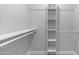 Closet features include shelving, hanging racks, and neutral paint at 2337 E Riviera Dr, Tempe, AZ 85282