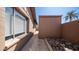 Side yard includes rock garden and a walkway alongside home at 2337 E Riviera Dr, Tempe, AZ 85282