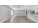 Open-concept living space with modern flooring, neutral walls, and seamless kitchen integration at 2337 E Riviera Dr, Tempe, AZ 85282