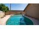 Backyard pool features a clean, blue pool surrounded by pavers and mature trees at 2337 E Riviera Dr, Tempe, AZ 85282