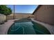View of the backyard featuring a private swimming pool and mature landscaping at 2337 E Riviera Dr, Tempe, AZ 85282
