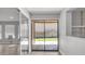 Sun room leading to backyard with an awning and a block wall at 2337 E Riviera Dr, Tempe, AZ 85282