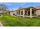 Manicured backyard featuring a lush green lawn at 23705 S Pleasant Way, Sun Lakes, AZ 85248