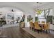 Open-concept design integrates the living and dining areas, perfect for entertaining and everyday living at 23705 S Pleasant Way, Sun Lakes, AZ 85248