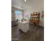 Bright kitchen featuring a large island, stainless steel appliances, and ample counter space for cooking and entertaining at 23705 S Pleasant Way, Sun Lakes, AZ 85248