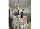 Bright kitchen featuring a charming breakfast nook with a chandelier, creating a cozy dining space at 23705 S Pleasant Way, Sun Lakes, AZ 85248