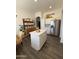 Bright kitchen featuring a large island, stainless steel appliances, and ample counter space for cooking and entertaining at 23705 S Pleasant Way, Sun Lakes, AZ 85248