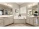 Bright bathroom with soaking tub, dual sinks, and tiled floor at 2701 N Black Rock Rd, Buckeye, AZ 85396