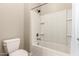 This bathroom features a shower, bathtub, and toilet with tiled floor at 2701 N Black Rock Rd, Buckeye, AZ 85396
