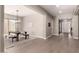 Dining area featuring modern chandelier and a large table at 2701 N Black Rock Rd, Buckeye, AZ 85396