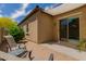 Private backyard patio featuring brick pavers, seating area, and covered shade, great for entertaining at 2701 N Black Rock Rd, Buckeye, AZ 85396