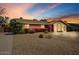 Charming single-story home featuring mature landscaping, desert landscaping, and a well-maintained exterior at 2846 E Lupine Ave, Phoenix, AZ 85028