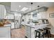 Bright, updated kitchen with stainless steel appliances, granite countertops, and a convenient breakfast bar at 2846 E Lupine Ave, Phoenix, AZ 85028