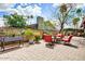 Charming backyard patio featuring stylish outdoor furniture, perfect for entertaining guests and enjoying the outdoors at 2846 E Lupine Ave, Phoenix, AZ 85028