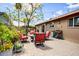 Cozy outdoor patio area with comfortable seating, lush plants, and charming decor creating a relaxing atmosphere at 2846 E Lupine Ave, Phoenix, AZ 85028
