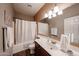 Cozy bathroom with vanity, shower, tub, and decorative mirror at 2886 E Hazeltine Way, Chandler, AZ 85249