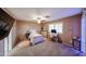 Warm bedroom with a cozy bed, desk area, and bright window, ideal for study and relaxation at 2886 E Hazeltine Way, Chandler, AZ 85249