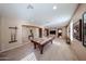 Expansive game room boasting a pool table, neutral tones, and easy access to other living spaces at 2886 E Hazeltine Way, Chandler, AZ 85249
