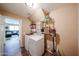 Practical laundry room features washer, dryer, storage shelves, and easy access at 2886 E Hazeltine Way, Chandler, AZ 85249