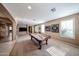 Large rec room with pool table, carpeted floors, neutral colors, and multiple windows at 2886 E Hazeltine Way, Chandler, AZ 85249