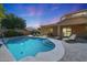 Inviting backyard pool with patio, lounge chairs, and covered outdoor dining area, perfect for relaxing and entertaining at 2886 E Hazeltine Way, Chandler, AZ 85249