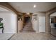Elegant staircase with decorative wall niches and carpeted steps that lead to the upper level at 2886 E Hazeltine Way, Chandler, AZ 85249
