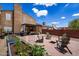 Private backyard with paver patio, firepit, pergola, and a garden at 2941 E Nisbet Ct, Phoenix, AZ 85032