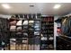 A spacious walk-in closet featuring built-in shelving for easy organization at 2941 E Nisbet Ct, Phoenix, AZ 85032