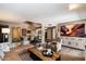 Spacious living room provides a welcoming atmosphere with hardwood floors and modern decor at 2941 E Nisbet Ct, Phoenix, AZ 85032