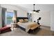 Cozy main bedroom with a king bed, soft lighting, and a dedicated exercise area at 2941 E Nisbet Ct, Phoenix, AZ 85032
