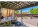 Charming covered patio with comfortable seating and a cozy outdoor space at 2941 E Nisbet Ct, Phoenix, AZ 85032
