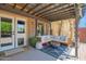 Inviting covered patio with comfortable seating and modern decor, perfect for outdoor relaxation and entertaining at 2941 E Nisbet Ct, Phoenix, AZ 85032