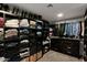 Spacious walk-in closet with custom shelving and storage solutions for organization at 2941 E Nisbet Ct, Phoenix, AZ 85032