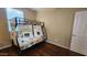 Bedroom with a bunk bed featuring a cute market themed covering on the lower level of the bed at 29740 N 121St Ave, Peoria, AZ 85383