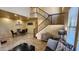 Elegant entryway with staircase and dining area with stylish chandelier at 29740 N 121St Ave, Peoria, AZ 85383