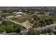 Aerial shot features a community garden, school, and storage, providing a holistic living environment at 3065 E Tamarisk St, Gilbert, AZ 85296