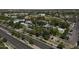 An aerial view of the commercial district featuring unique buildings and landscaping along a busy street at 3065 E Tamarisk St, Gilbert, AZ 85296