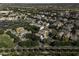 Expansive aerial perspective of the neighborhood showcasing its extensive landscaping, quiet streets, and diverse architectural styles at 3065 E Tamarisk St, Gilbert, AZ 85296