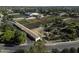 A vibrant aerial scene showcasing a community garden, recreational areas, and charming landscaping, offering a serene lifestyle at 3065 E Tamarisk St, Gilbert, AZ 85296