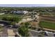 Aerial view of a community near manicured grounds and sports field, offering a peaceful retreat with modern amenities at 3065 E Tamarisk St, Gilbert, AZ 85296